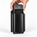 A black textured leather Adyen POS handheld holster holding a black card reader device, with a hand inserting the device. The holster has AGOZ printed on the bottom right corner.