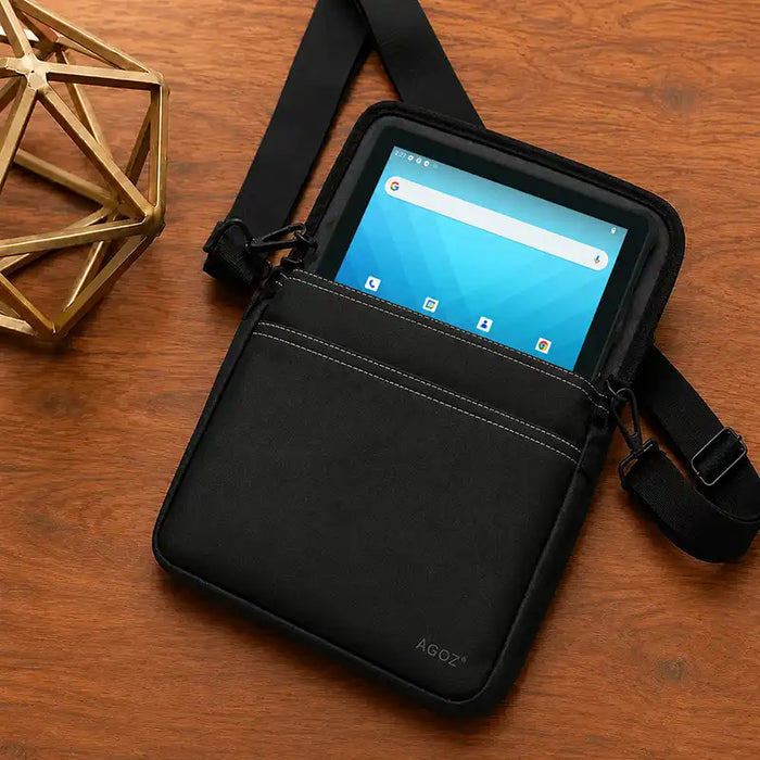 Black Unitech RT112 crossbody carrying case with storage pocket and shoulder strap on a tabletop