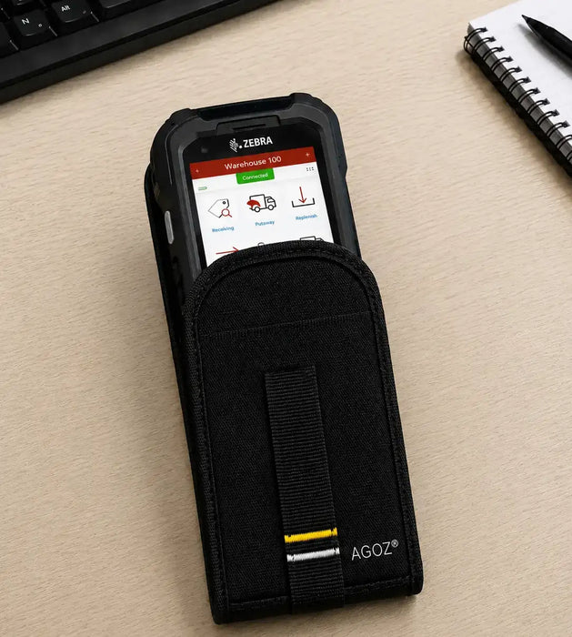 Black mobile computer case with Zebra scanner on a beige surface