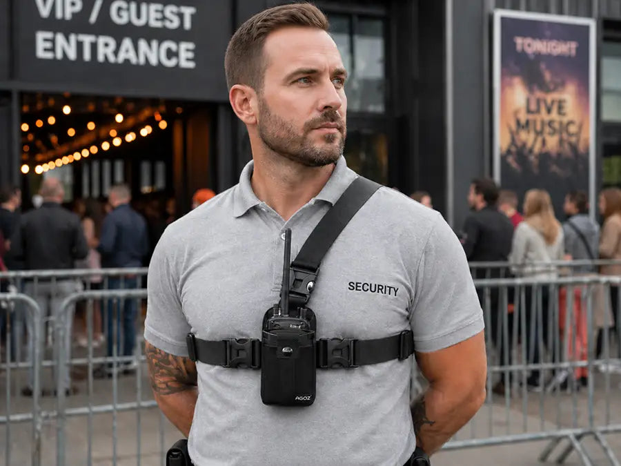 Security worker wearing Icom radio chest harness holster at event entrance