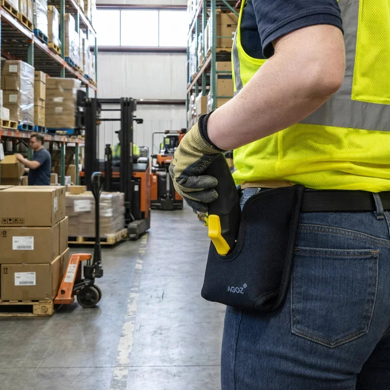 Warehouse worker reaching for Zebra TC58 scanner with trigger handle in AgozTech holster case