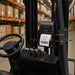 Citizen mobile printer secured in an Agoz metal forklift holder inside a warehouse aisle setup